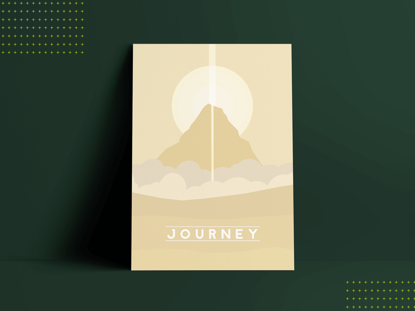 A poster representing the video game, Journey, is centered right in the middle of the image lying against a plain forest green wall. Inside the poster is a mountain with a ray of light right in front of it and the sun behind it. Below the mountain is a cloud of dust and a visible desert terrain. Towards the bottom of the poster is the word 